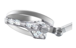 Eine silberne LED-Lupenleuchte mit modernem Design und leuchtenden Linsen